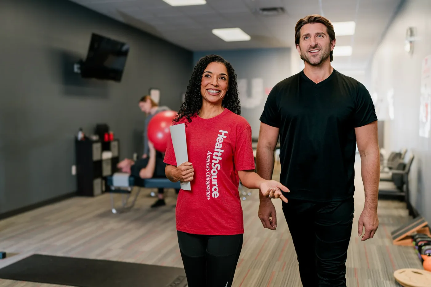 HealthSource Chiropractic clinician working with a patient