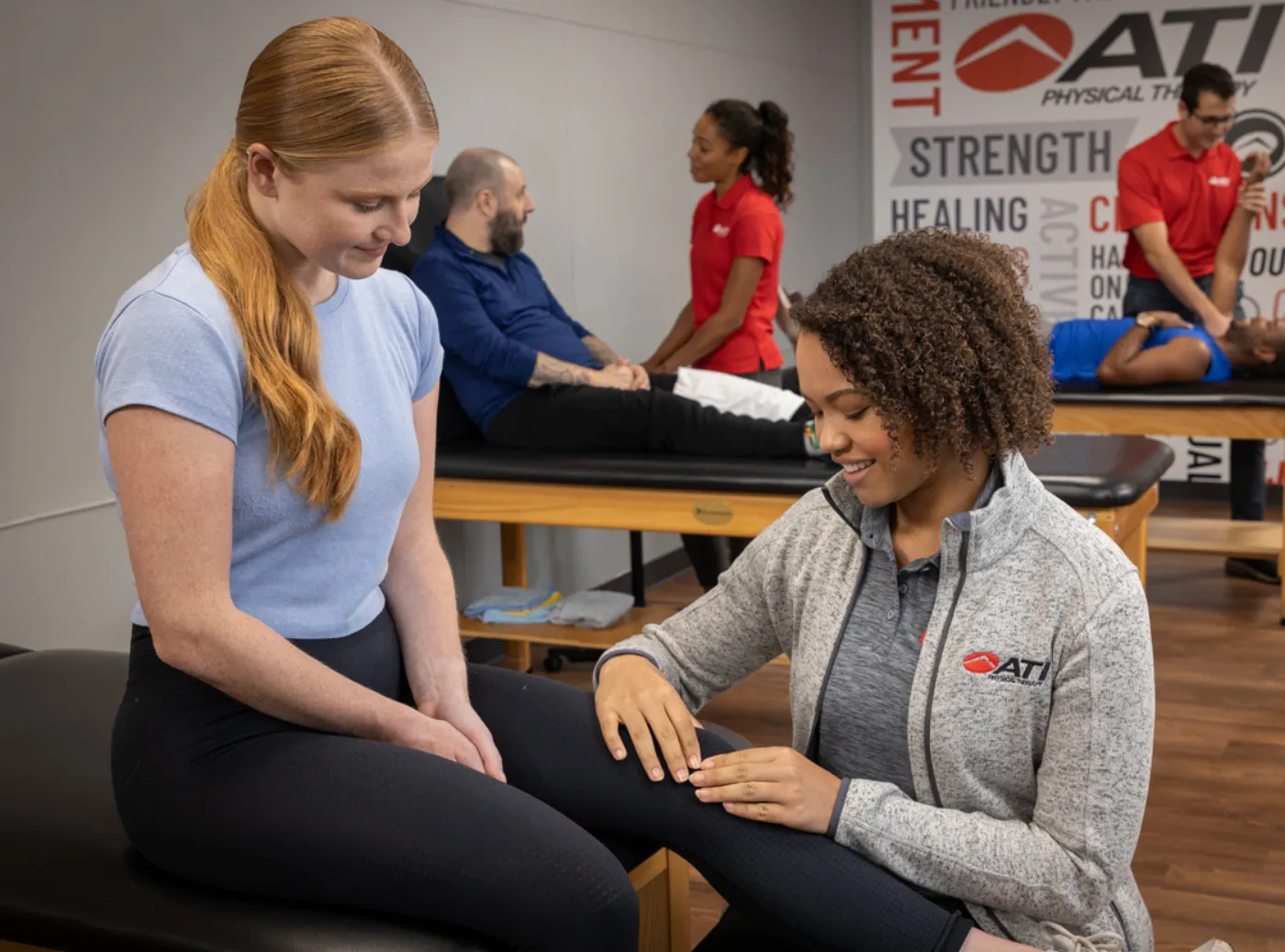 ATI therapist helping a patient during knee rehabilitation
