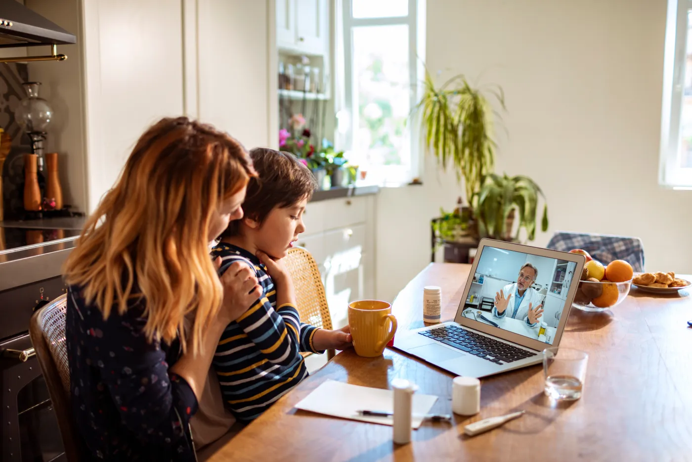 CityMD homepage image of a family using virtual care from home