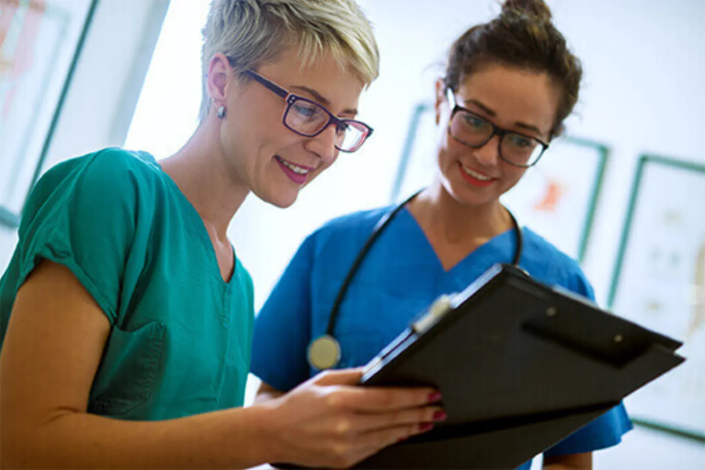 USA Vein Clinics clinicians reviewing a patient chart