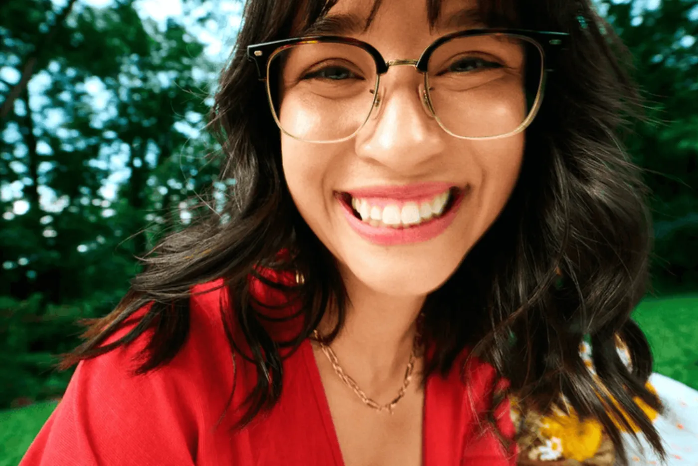 America's Best homepage creative featuring a smiling customer wearing glasses
